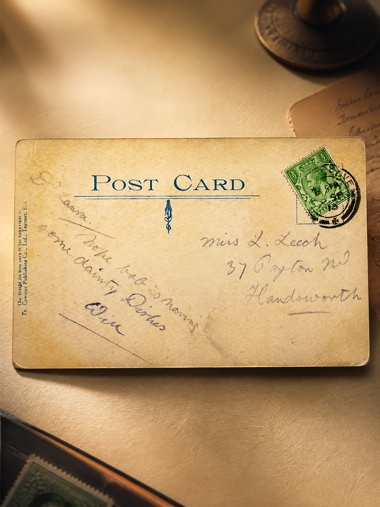 Back of a vintage postcard with elegant old-style cursive handwriting